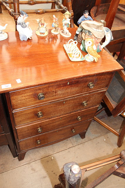 Appraisal: A SMALL SIZED MAHOGANY CHEST of four drawers standing on