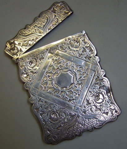 Appraisal: A Victorian silver shaped rectangular visiting card case with floral