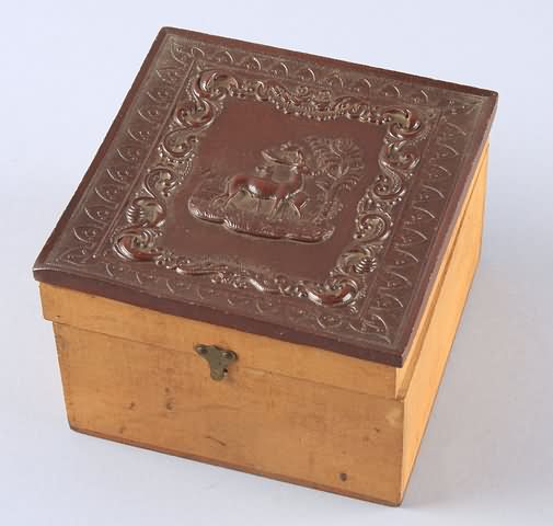 Appraisal: th century thermoplastic lidded collar box featuring deer and pine