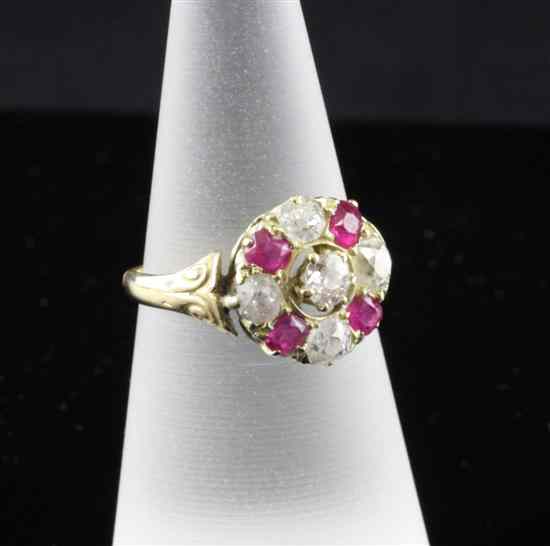 Appraisal: An Edwardian ruby and diamond set gold cluster ring size