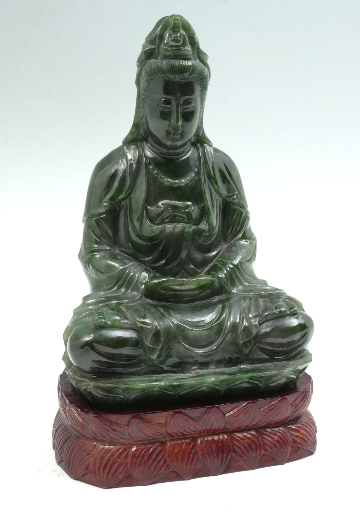 Appraisal: CARVED SPINACH JADE BUDDAH Carved green spinach jade in the