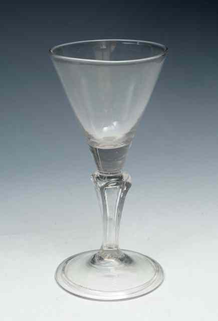 Appraisal: A FOUR SIDED SILESIAN STEM WINE GLASS ON CONICAL FOLDED