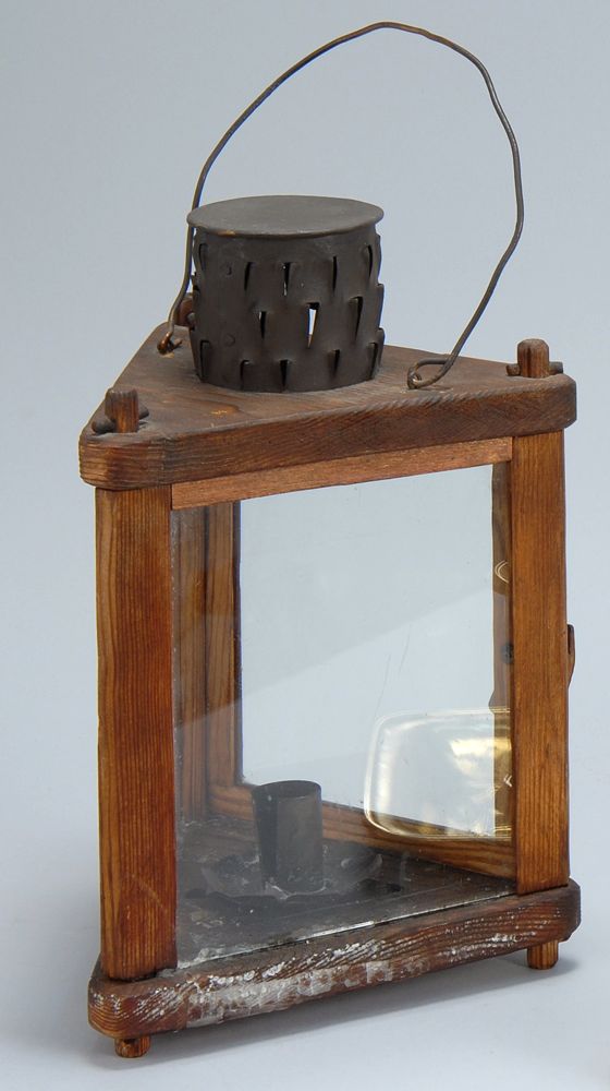 Appraisal: TRI-CORNER WOOD AND TIN HANGING CANDLE LAMP In Colonial style