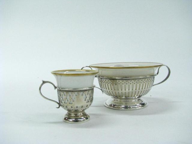 Appraisal: Set of bullion cups with sterling silver handled bases and