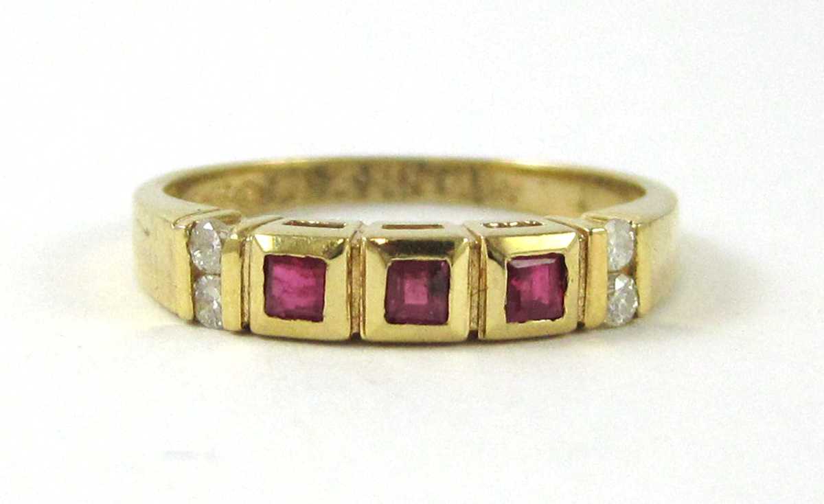 Appraisal: RUBY DIAMOND AND FOURTEEN KARAT GOLD RING set with three