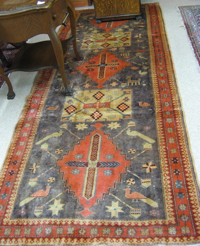 Appraisal: PERSIAN SARAB RUNNER hand knotted in a pattern of five