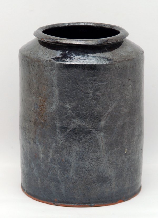 Appraisal: Redware jar with black alkaline glaze to body unglazed base