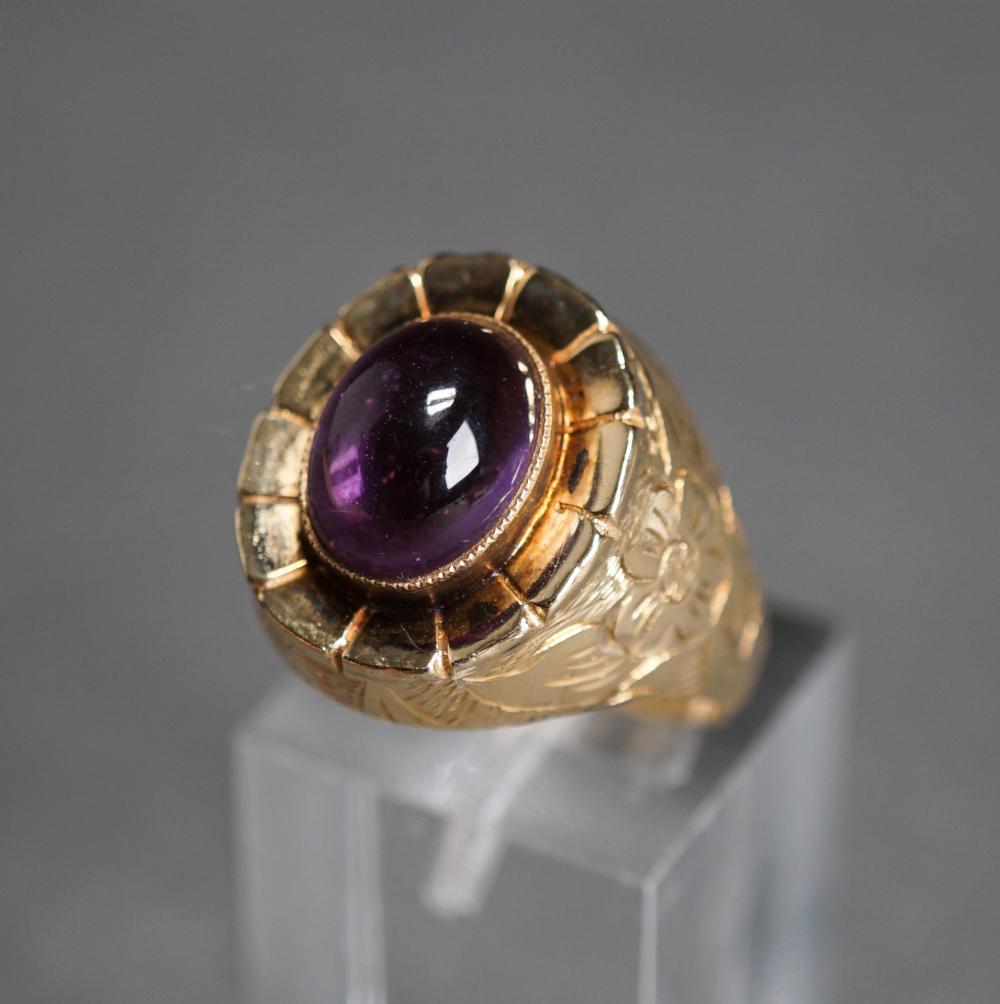 Appraisal: -KARAT YELLOW-GOLD AND AMETHYST CABOCHON RING GROSS DWT SIZE -Karat