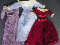 Appraisal: DOLL OUTFITS st Purple and white blouse skirt waist long