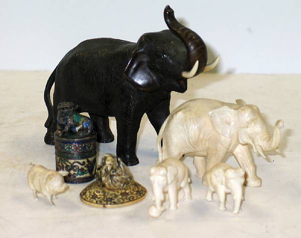 Appraisal: Seven Asian ivory and metal decorations Comprising a Chinese enameled