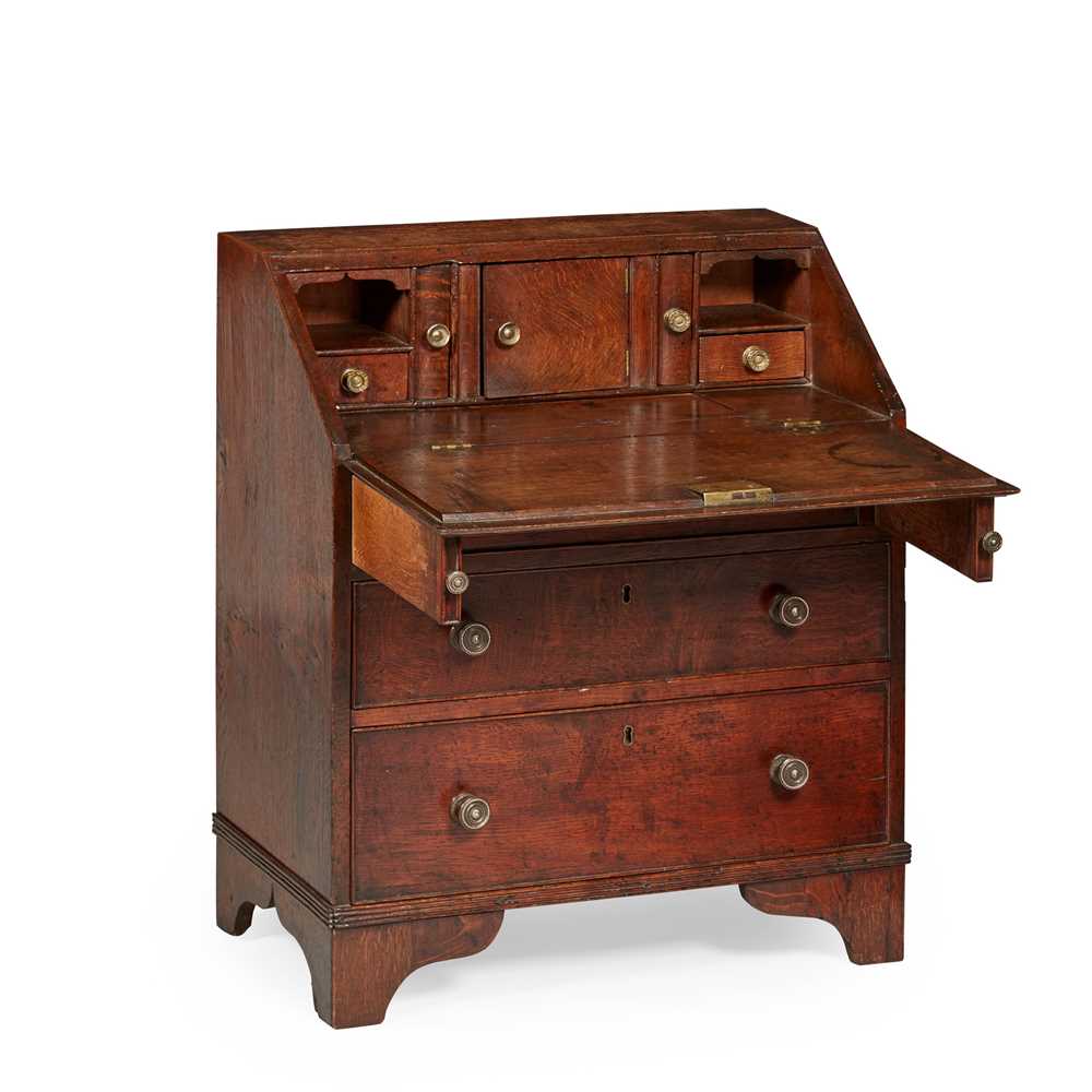 Appraisal: CHILD'S OAK BUREAU TH CENTURY of diminutive form the slant