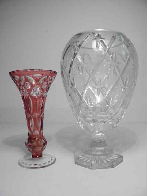 Appraisal: Lot of two cut crystal vases Includes one cranberry cut