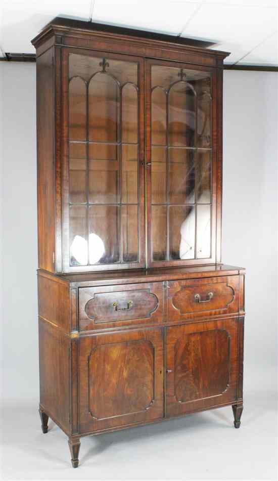 Appraisal: A Regency mahogany secretaire bookcase with two astragal glazed doors