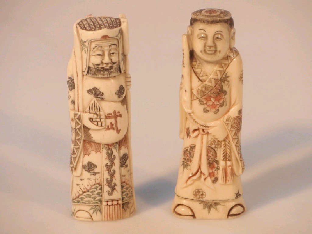 Appraisal: Two carved bone chess figures cm