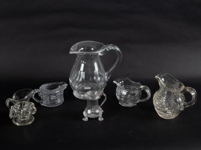 Appraisal: A small th Century glass cream jug set on three