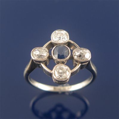 Appraisal: A sapphire and diamond ring the sapphire is set within