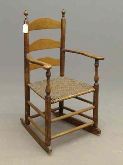 Appraisal: th c ladderback rocking chair '' Seat Ht '' Overall