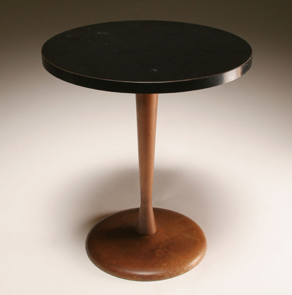 Appraisal: Danish Modern cocktail table with black circular top tapered pedestal