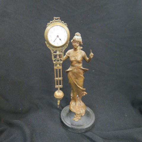 Appraisal: Bronzed Figural Clock lady holding a watch tall working