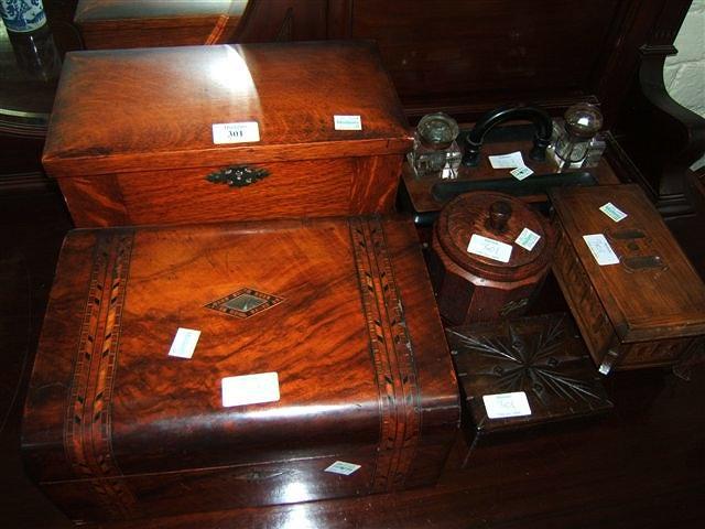 Appraisal: A Victorian walnut desk stand with two inkwells a late