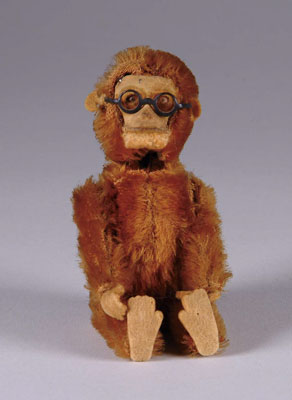 Appraisal: YES NO SCHUCO MONKEY Germany Desirable mohair figure depicts tin