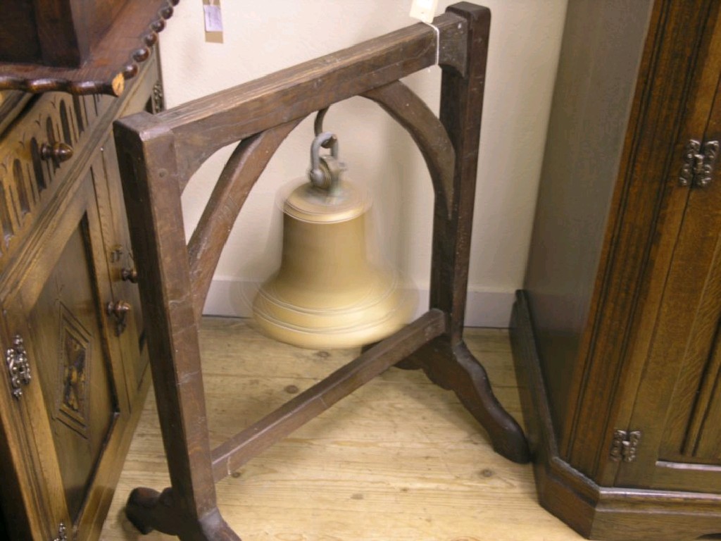 Appraisal: A ship's bell pendant from an oak frame ft in