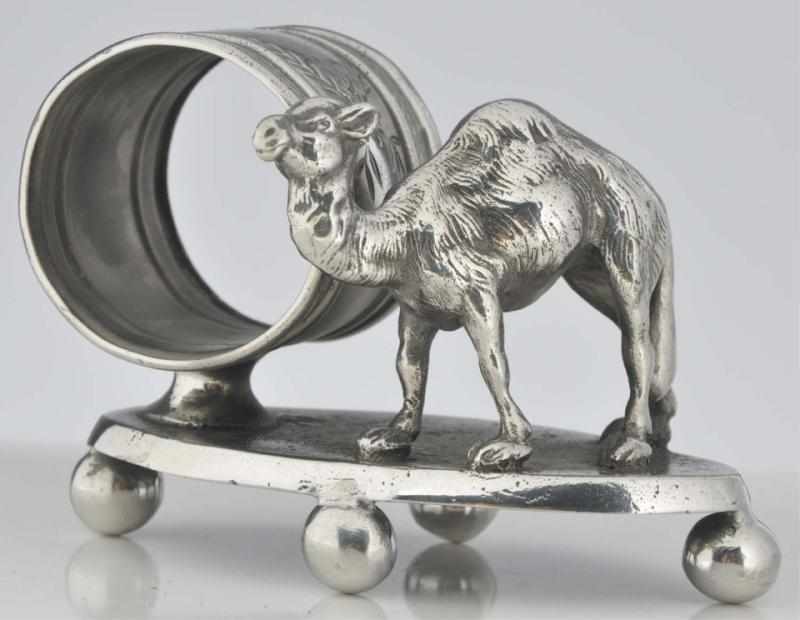 Appraisal: Camel by Holder Figural Napkin Ring On oval footed base