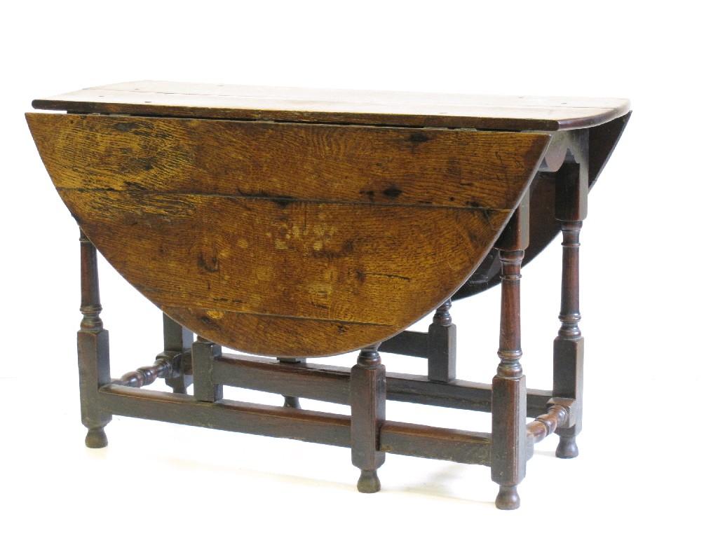 Appraisal: A late th Century oval Gate-leg Table turned and square