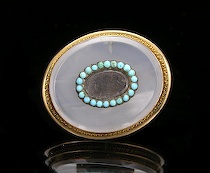 Appraisal: A Chalcedony Mourning Pendant-Brooch Victorian oval pendant in gilt metal