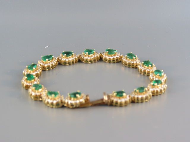 Appraisal: Emerald Diamond Bracelet pear shape emeralds totaling carats each surrounded