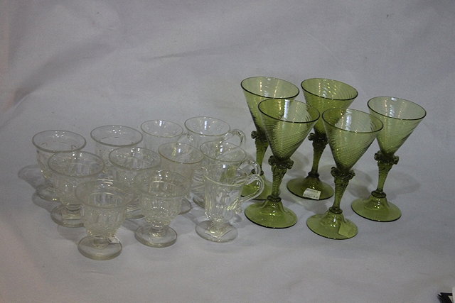 Appraisal: A SET OF FIVE VENETIAN GREEN GLASS WINE GLASSES a