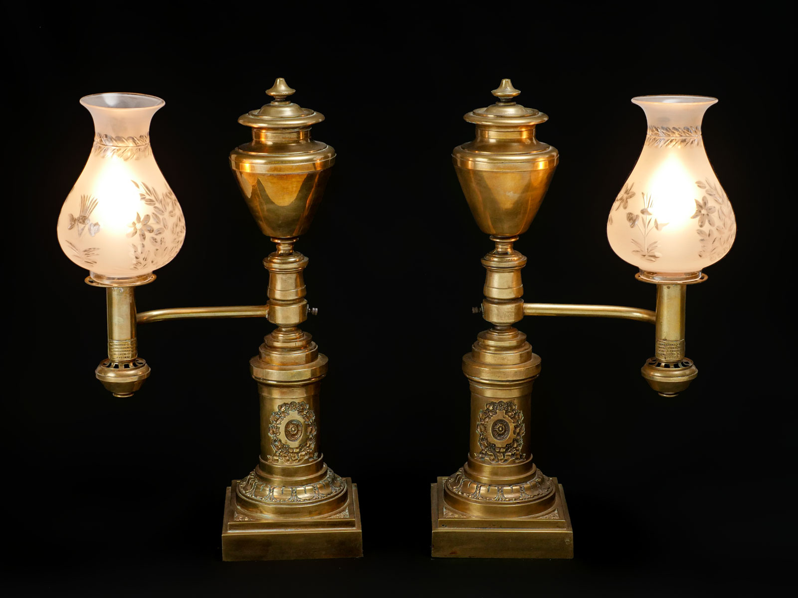 Appraisal: PAIR OF MESSENGER SONS ARGAND LAMPS Opposing Argand lamps by