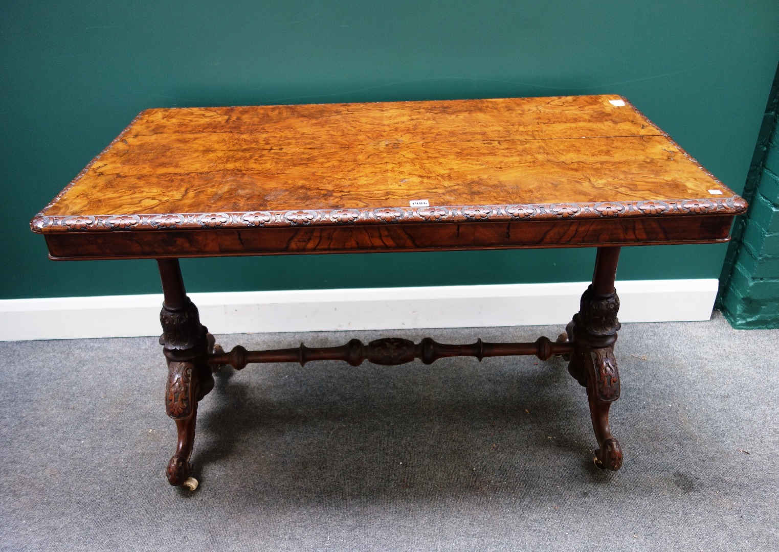 Appraisal: A Victorian figured walnut centre table the rectangular top with