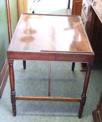 Appraisal: A th century mahogany rectangular table united by a H