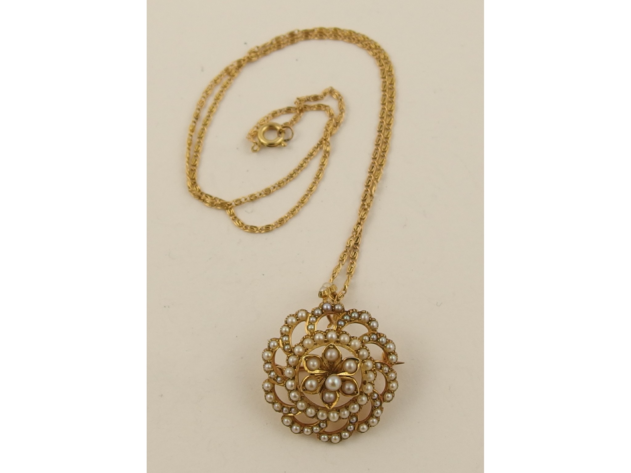 Appraisal: A ct Edwardian pearl set pendant brooch with gold plated