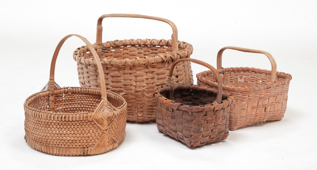 Appraisal: FOUR AMERICAN BASKETS Late th-early th century woven splint with