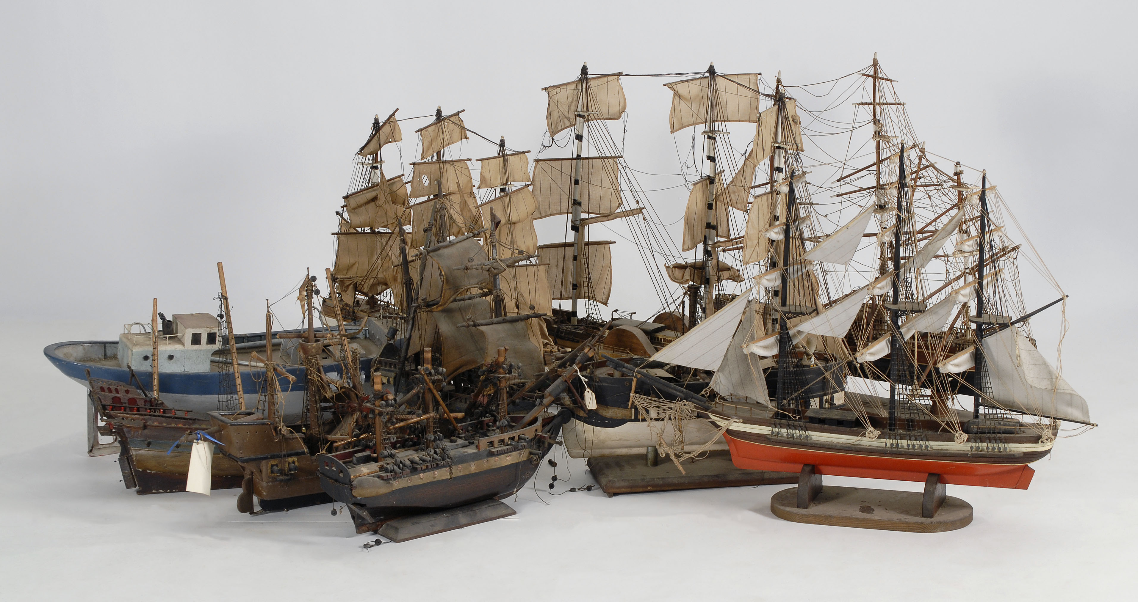 Appraisal: TWELVE ASSORTED UNCASED SHIP MODELS First Half of the th