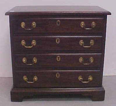 Appraisal: th C small four drawer chest mahogany with oak secondary