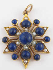 Appraisal: A yellow metal tests carat gold star pendant set with