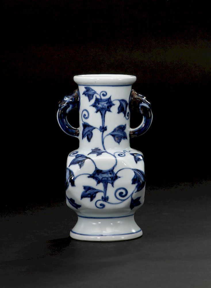 Appraisal: Blue and White Facetted Vase The square body with chamfered