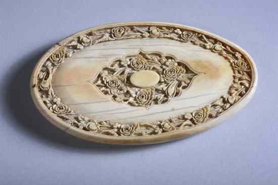 Appraisal: CHINESE IVORY OVAL PLAQUE th century Carved with shaped cartouche