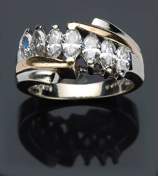 Appraisal: A diamond and k bicolor gold ring estimated total diamond