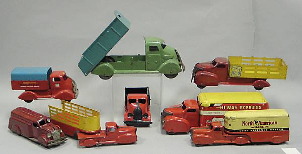 Appraisal: Marx transportation toys Lot includes tank with treads tractor North