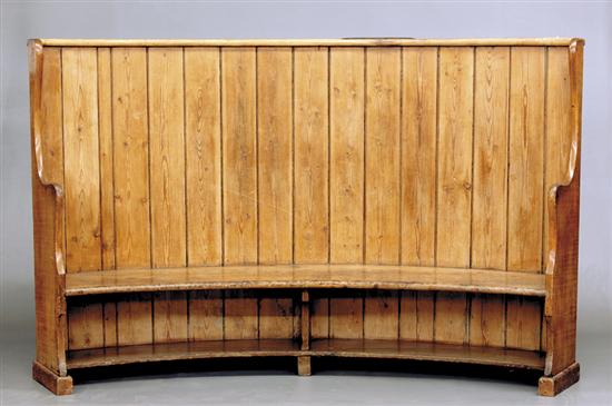 Appraisal: Scottish pine settle circa crescent shape with molded toprail and