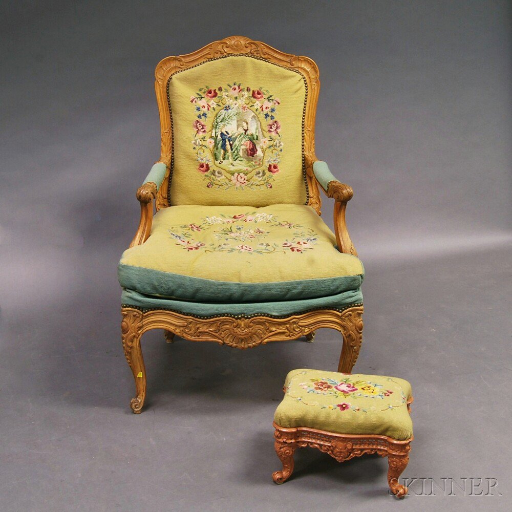 Appraisal: Louis XV-style Carved Fruitwood Fauteuil and a Cast Iron Footstool