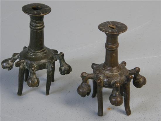 Appraisal: Pair of Chinese bronze candlesticks with bells at the four