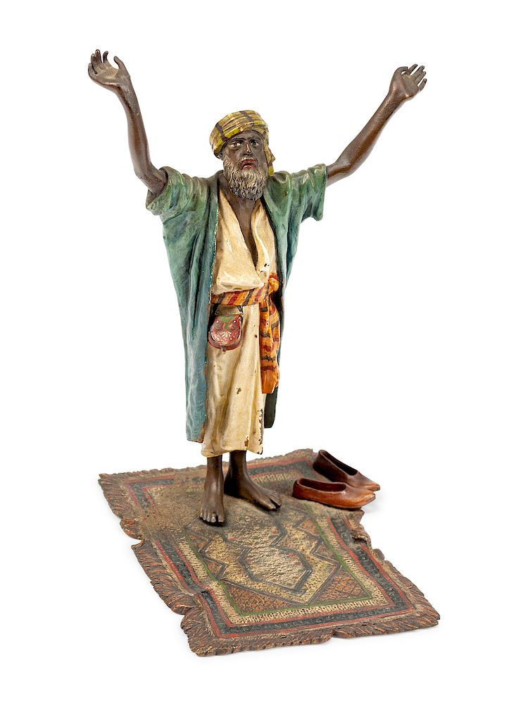 Appraisal: An Austrian Cold-Painted Bronze Figure of a Man Praying on