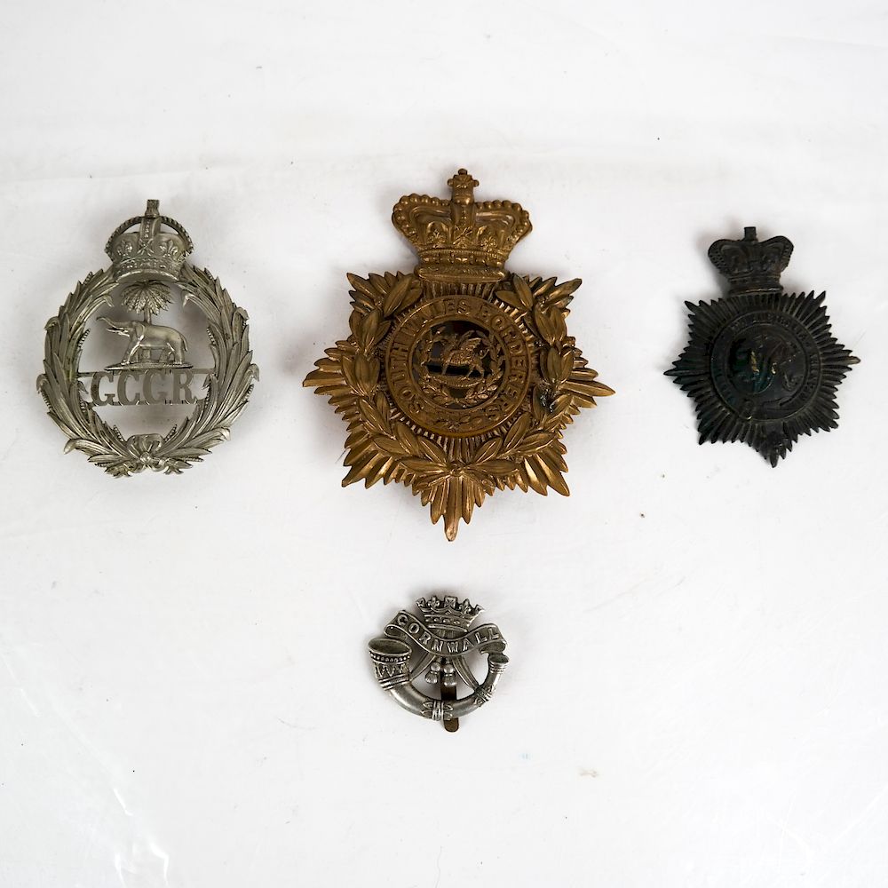 Appraisal: Four Mixed Metal Badges South Wales Border South Australia Militia