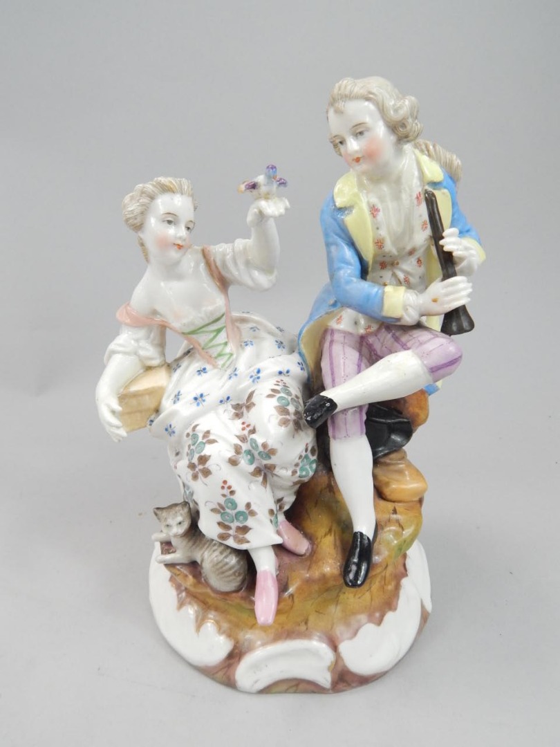 Appraisal: A late thC Sitzendorf porcelain figure group of a gentleman