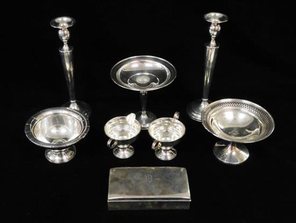 Appraisal: SILVER Weighted sterling holloware eight pieces pair of candlesticks h